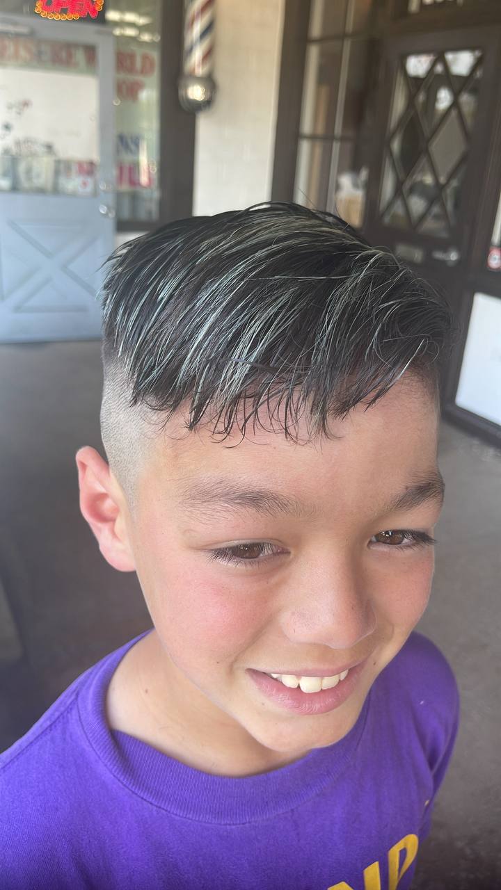 Kids' skin fade with a soft textured fringe